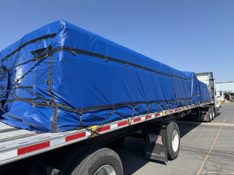 Flatbed load hauled by Delgado Trucking Services
